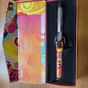 Amika titanium clip Curling Iron